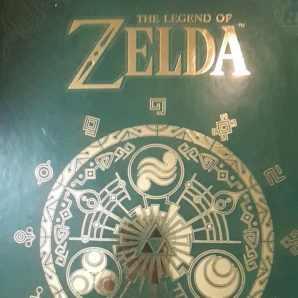 The Legend of Zelda Hyrule Historia. Hard bound book detailing the origins Zelda